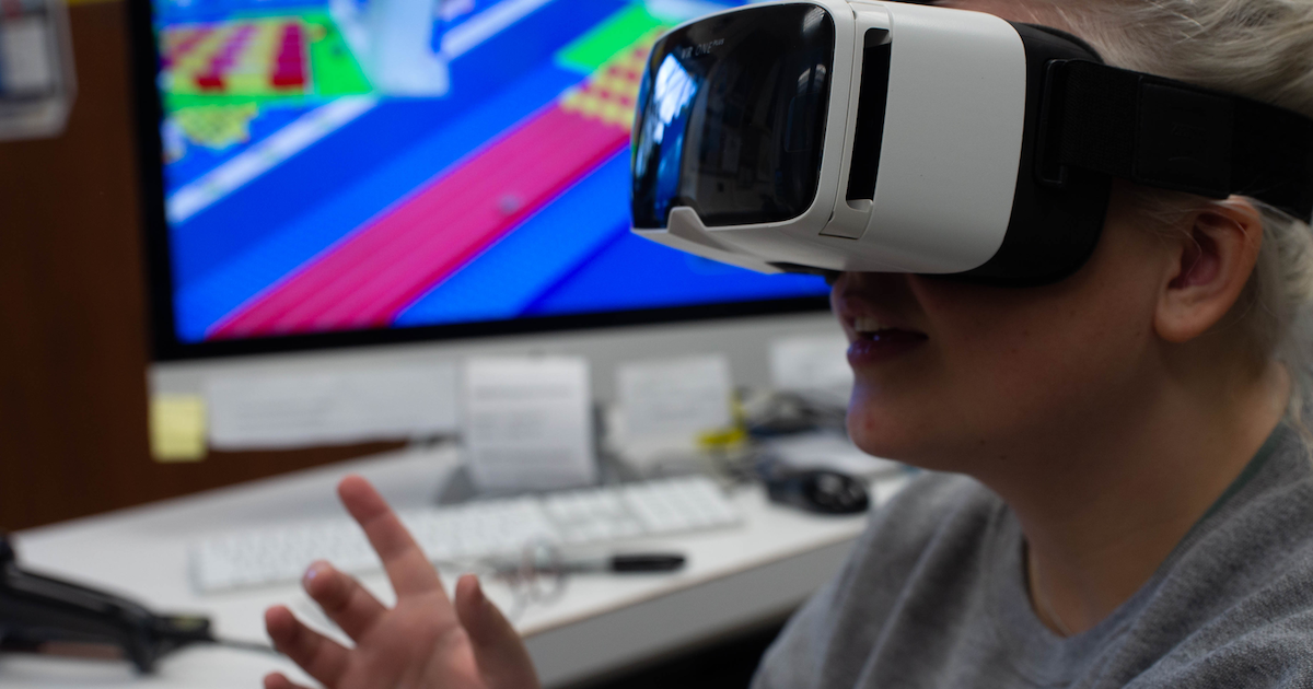 Student designing games in a VR environment